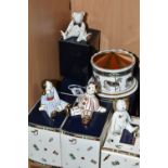 A GROUP OF BOXED ROYAL CROWN DERBY PAPERWEIGHTS AND MONEY BOX, comprising a 'Treasures of