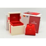 AN 'OMEGA' WATCH BOX, textured box with red ribbon detail, travel pouch interior, also including a