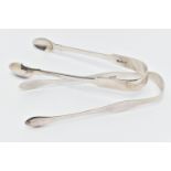 TWO PAIRS OF SILVER GEORGIAN SUGAR TONGS, the first a pair of polished fiddle pattern tongs,