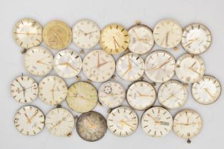 A BOX OF GENTS WATCH MOVEMENTS, various shapes, names to include 'Astral, Smiths, Garrard, J.W.