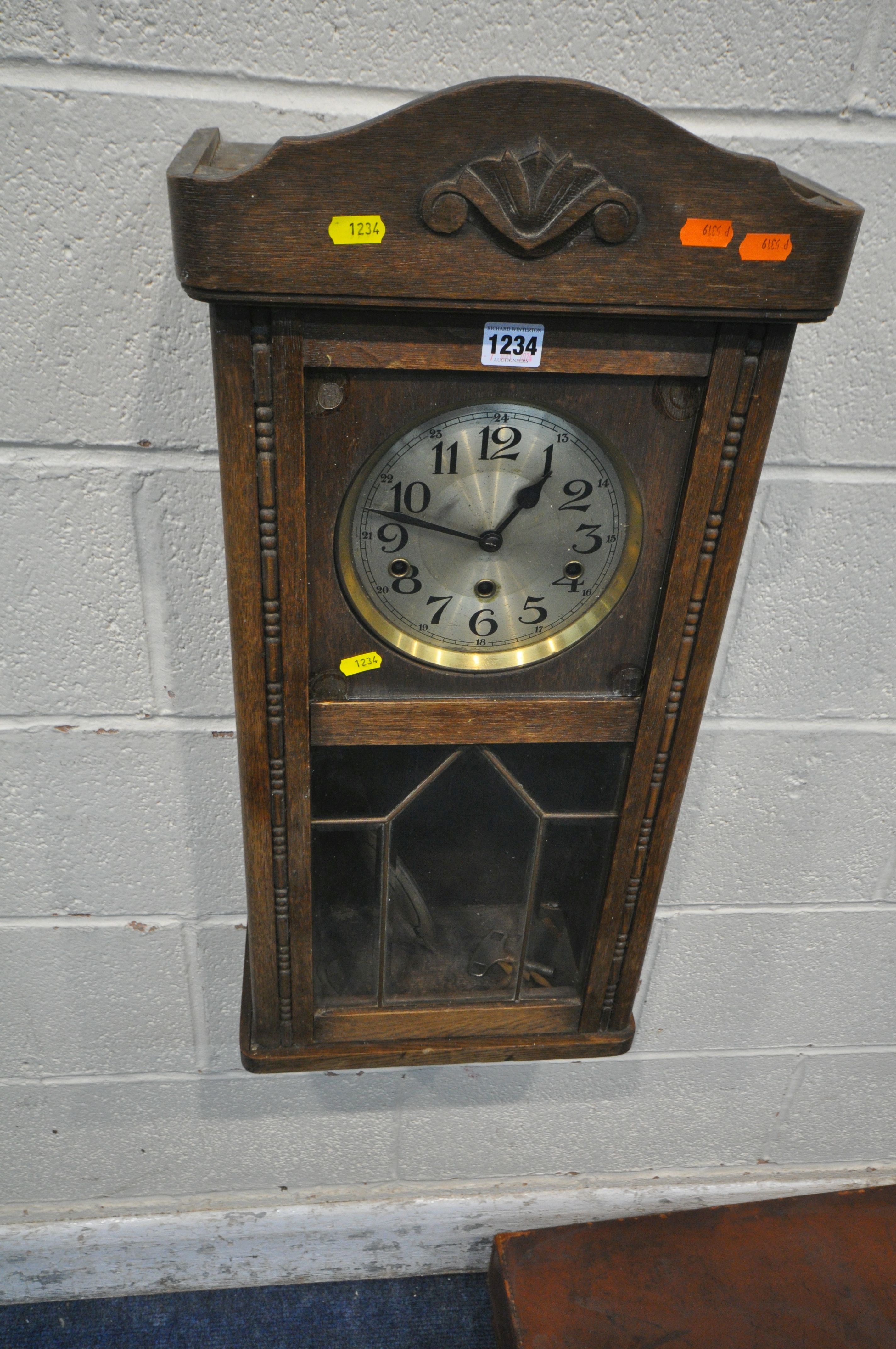 A WROUGHT IRON TELESCOPIC STANDARD LAMP, a 20th century oak clock and a leather case (condition - Image 4 of 4