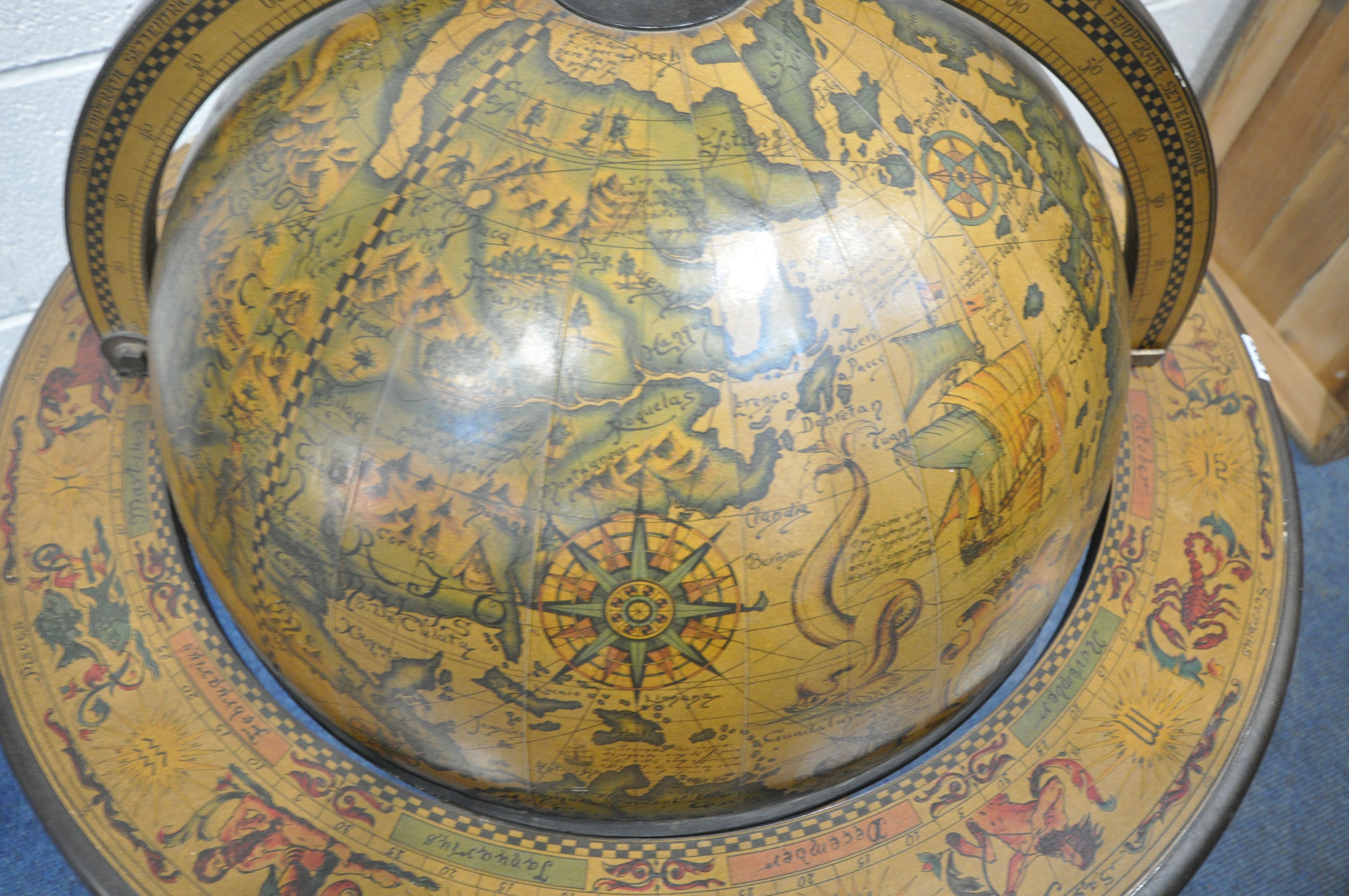 A 20TH CENTURY DRINKS GLOBE, with a hinged lid, enclosing a fitted interior, raised on spiral - Image 4 of 9