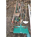 A COLLECTION OF GARDEN TOOLS including a snow shovel, spades, forks, etc (10+)