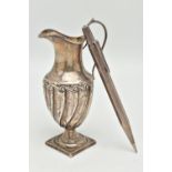 A SILVER PROPELLING 'YARD O LED' PENCIL AND A JUG, plain polished pencil with engraved initials '