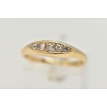 AN 18CT GOLD DIAMOND BOAT RING, set with five graduating, round brilliant and single cut diamonds,