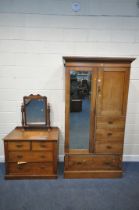 AN EARLY 20TH CENTURY WALNUT TWO PIECE BEDROOM SUITE, comprising a compactum wardrobe, fitted with a