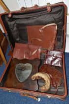 A BROWN TRAVELLING TRUNK, containing two brown leather school satchels (one monogrammed), a brown