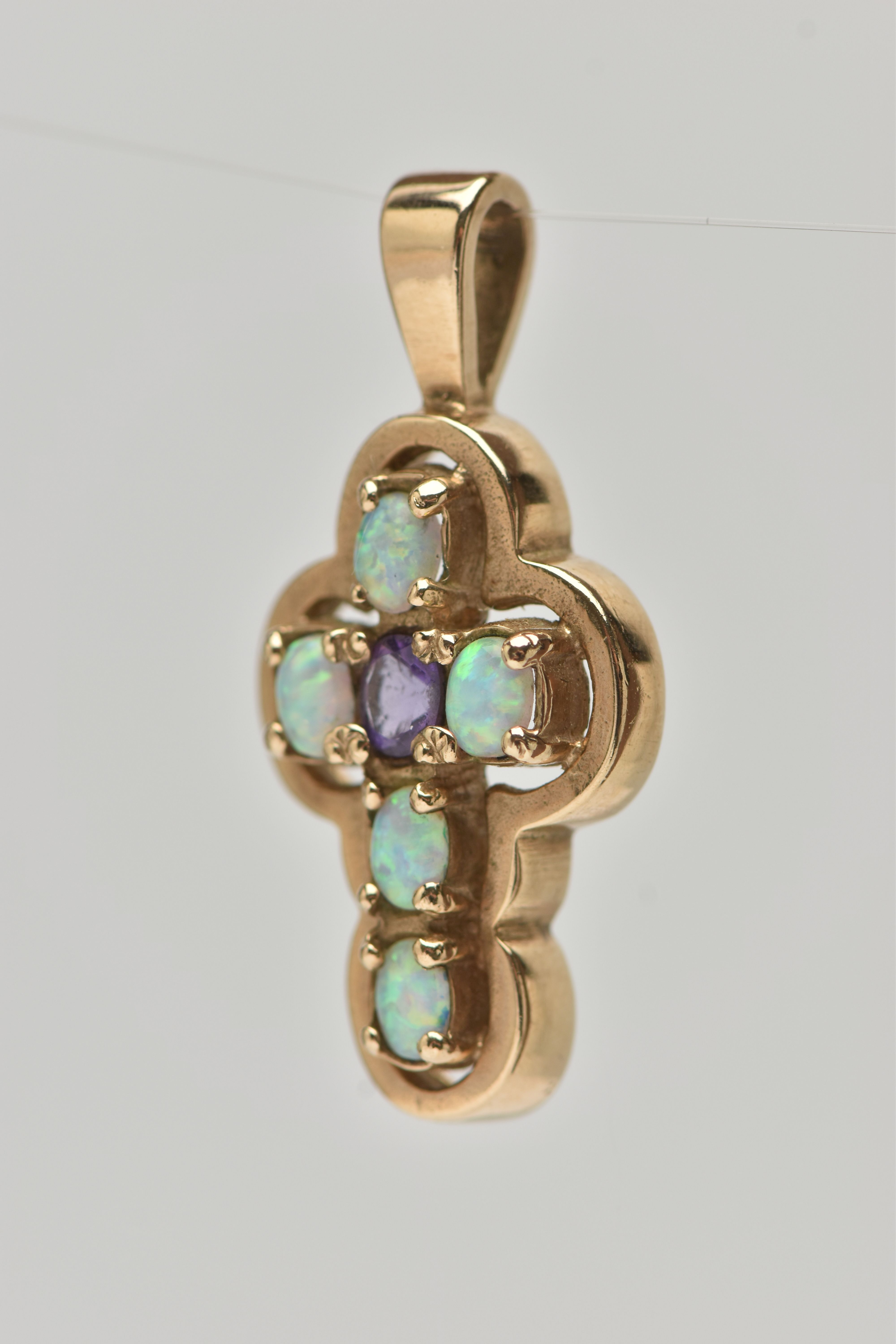 A 9CT GOLD AMETHYST AND SYNTHETIC OPAL CROSS PENDANT, set centrally with an oval cut amethyst, and - Image 2 of 4