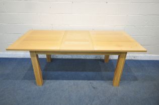 A LIGHT OAK RECTANGULAR EXTENDING DINING TABLE, with one additional leaf, extended length 200cm x