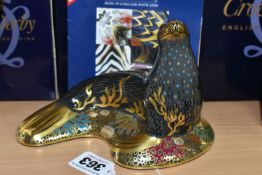 A BOXED ROYAL CROWN DERBY 'SEA LION' PAPERWEIGHT, with gold stopper, gold printed backstamp and date