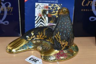 A BOXED ROYAL CROWN DERBY 'SEA LION' PAPERWEIGHT, with gold stopper, gold printed backstamp and date
