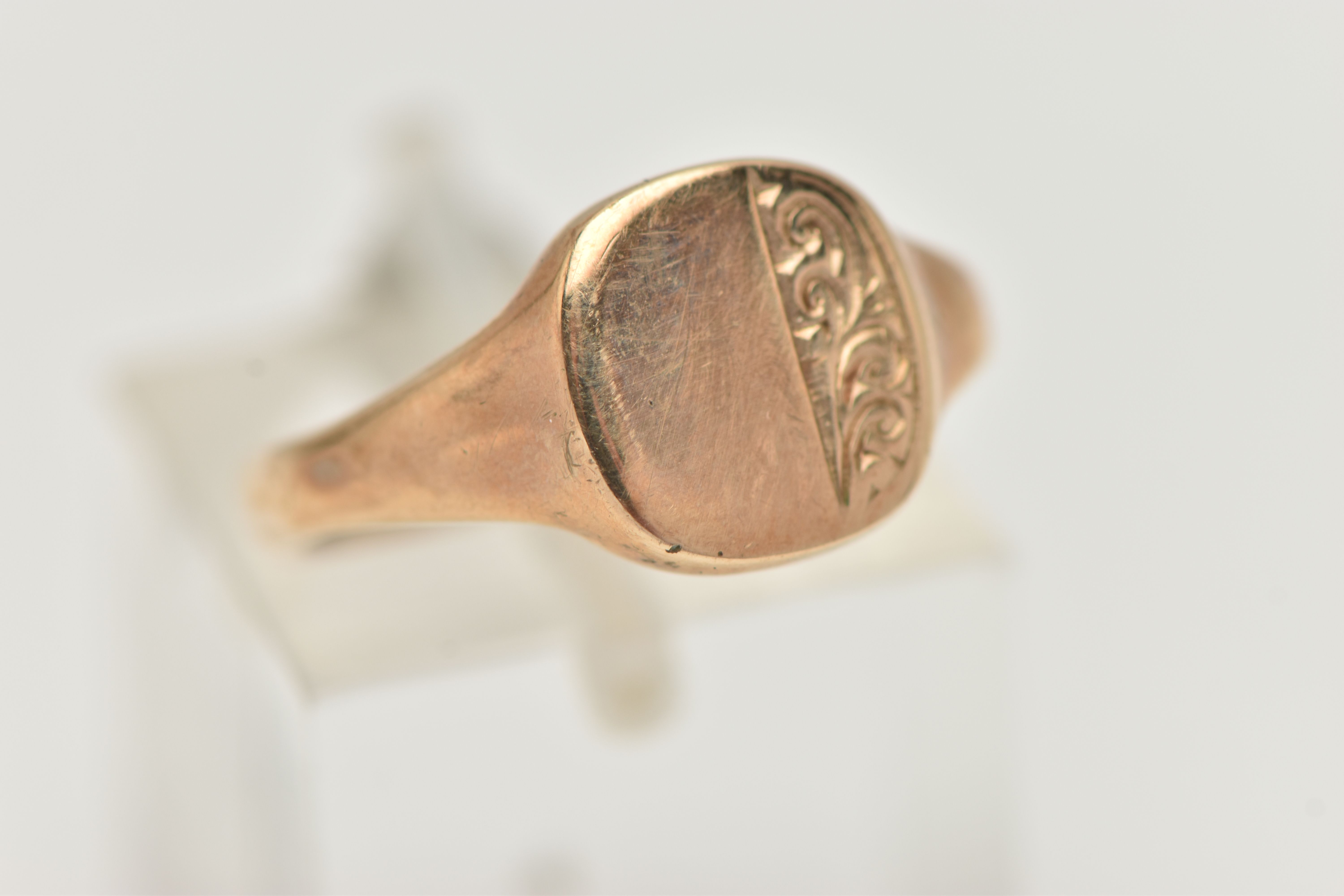 A 9CT GOLD SIGNET RING, rounded square form, with foliate pattern, tapering polished band, - Image 4 of 4