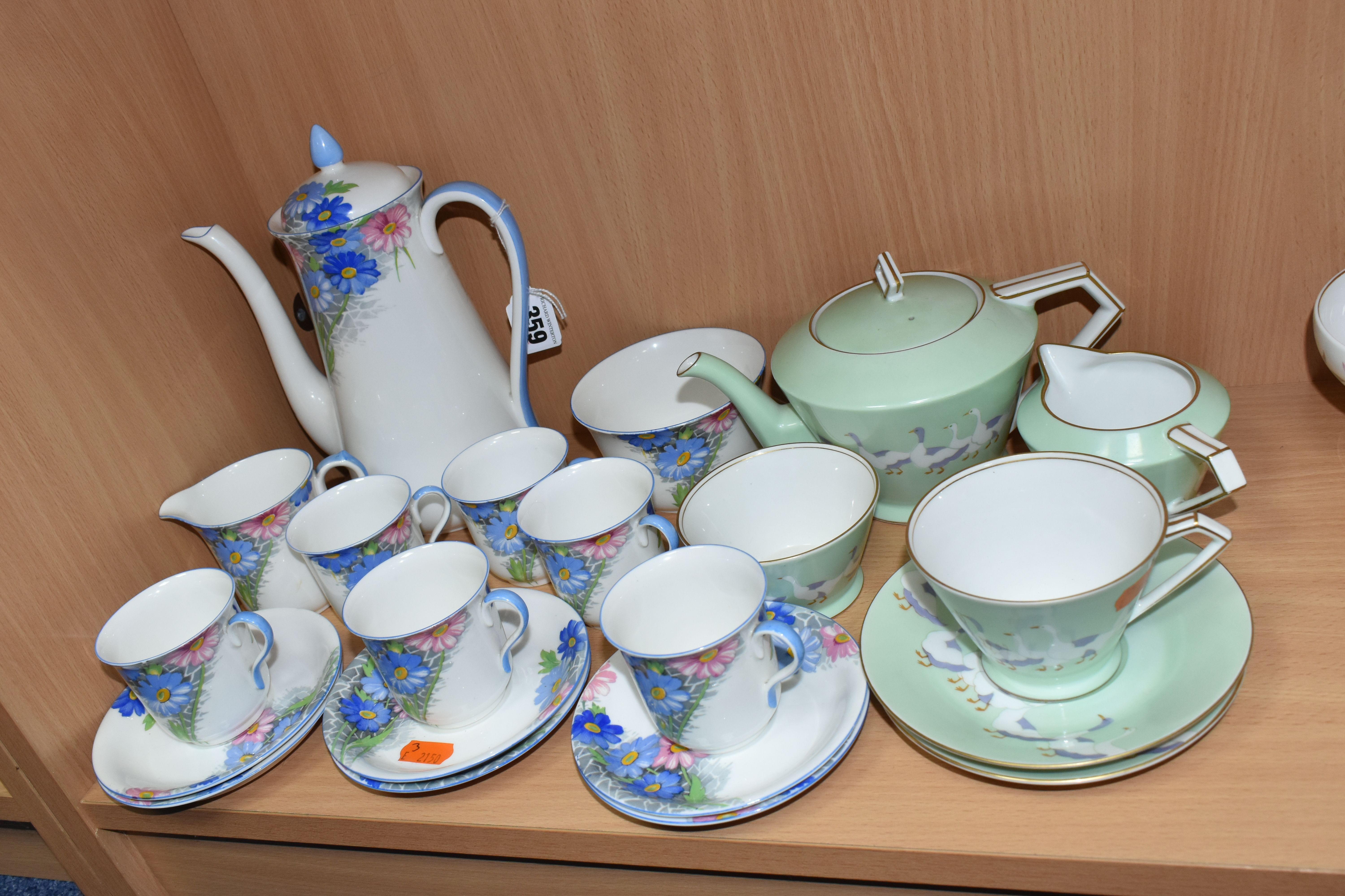 A SHELLEY COFFEE SET, pattern number 12216, decorated with a blue and pink floral design on a