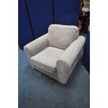 A BEIGE UPHOLSTERED ARMCHAIR, width 101cm x depth 92cm x height 88cm (condition report: general