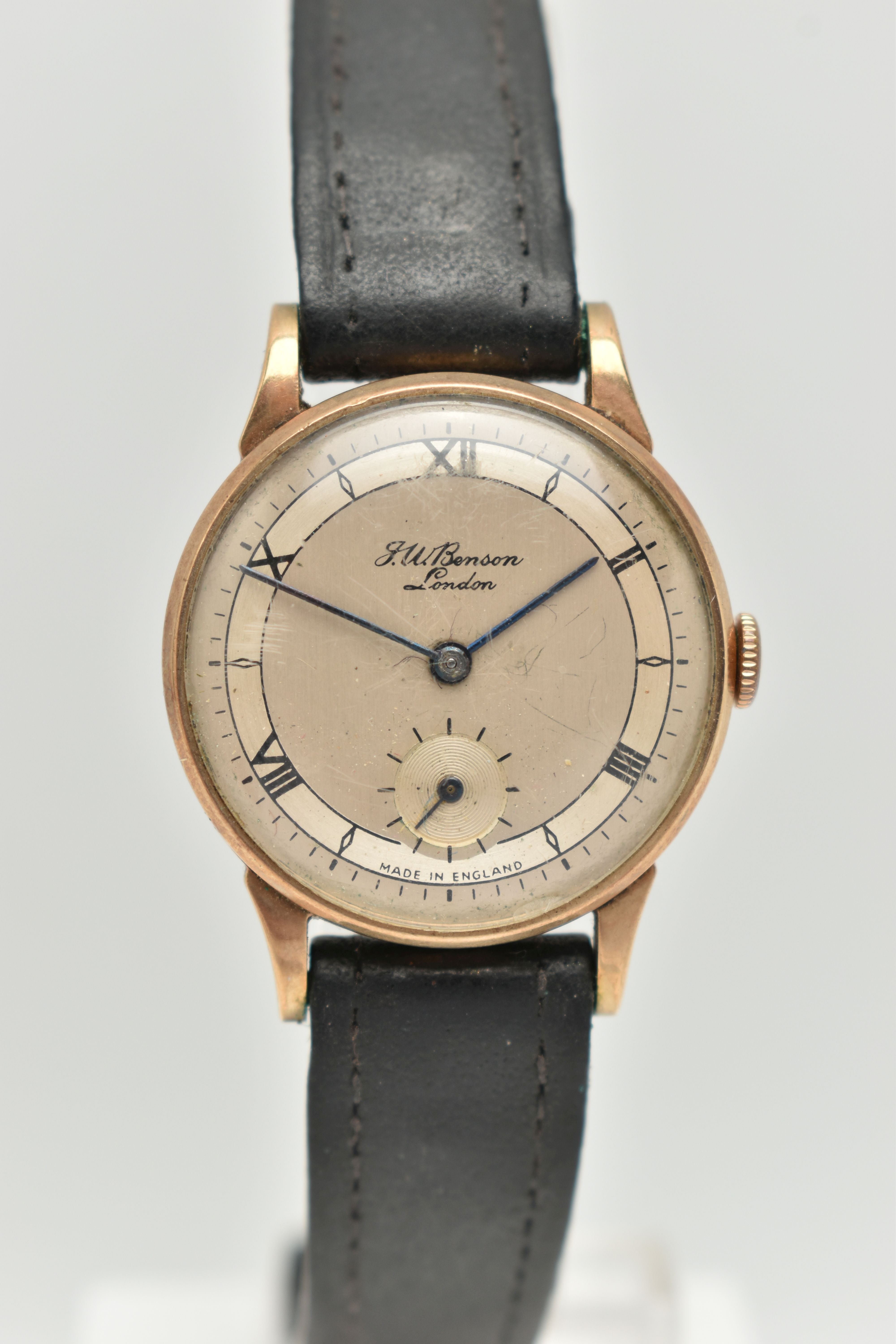 A GENTS 9CT GOLD 'J.W.BENSON' WRISTWATCH, manual wind, round silvered dial signed 'J.W.Benson