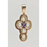 A 9CT GOLD AMETHYST AND SYNTHETIC OPAL CROSS PENDANT, set centrally with an oval cut amethyst, and