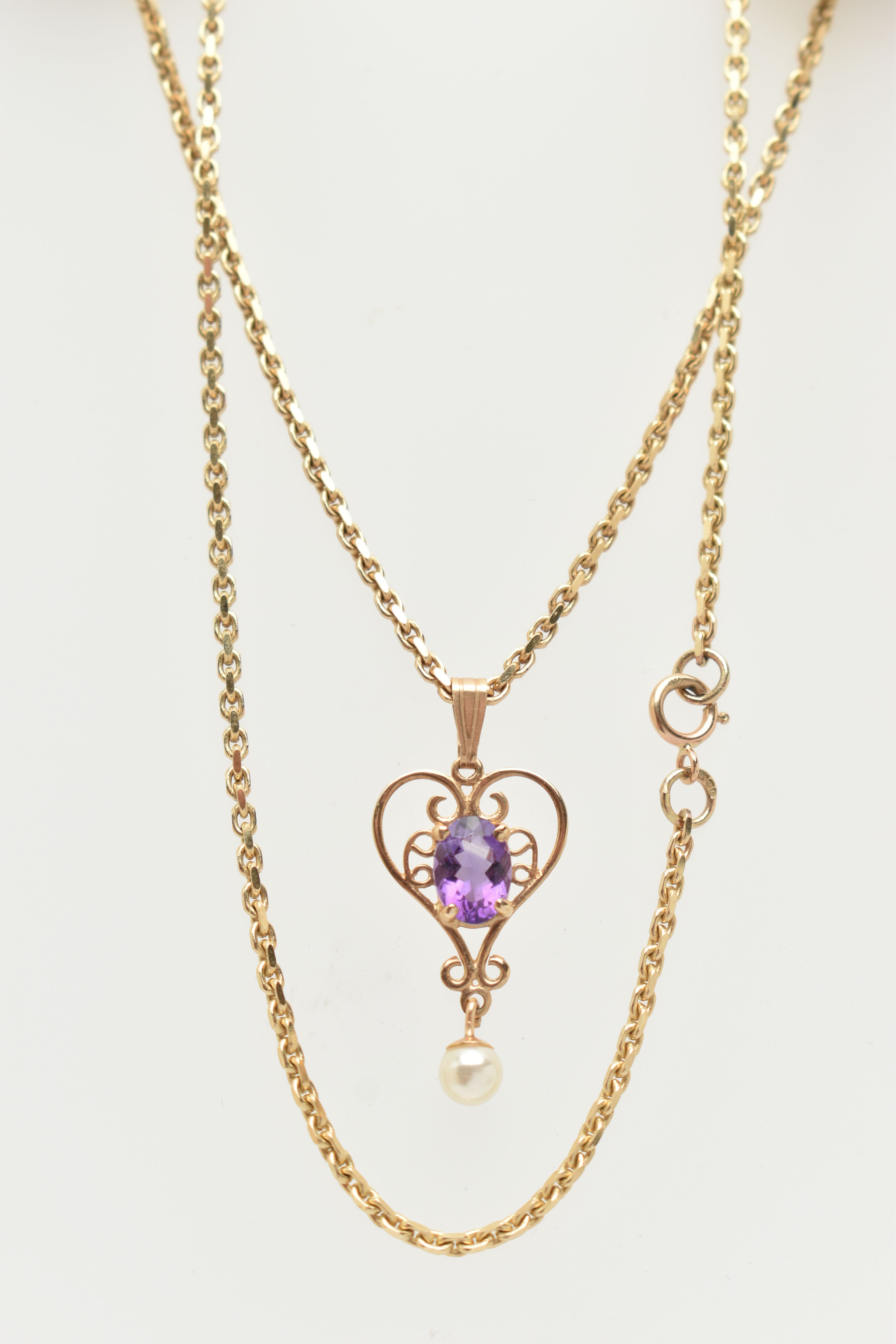 A 9CT GOLD PENDANT NECKLACE, heart shape scrolling pendant set with an oval cut amethyst four claw - Image 2 of 4