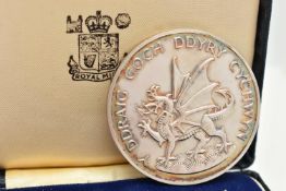 A ROYAL MINT BOXED PRINCE CHARLES INVESTITURE SILVER MEDAL 1969, slight toning, 70.5 gram