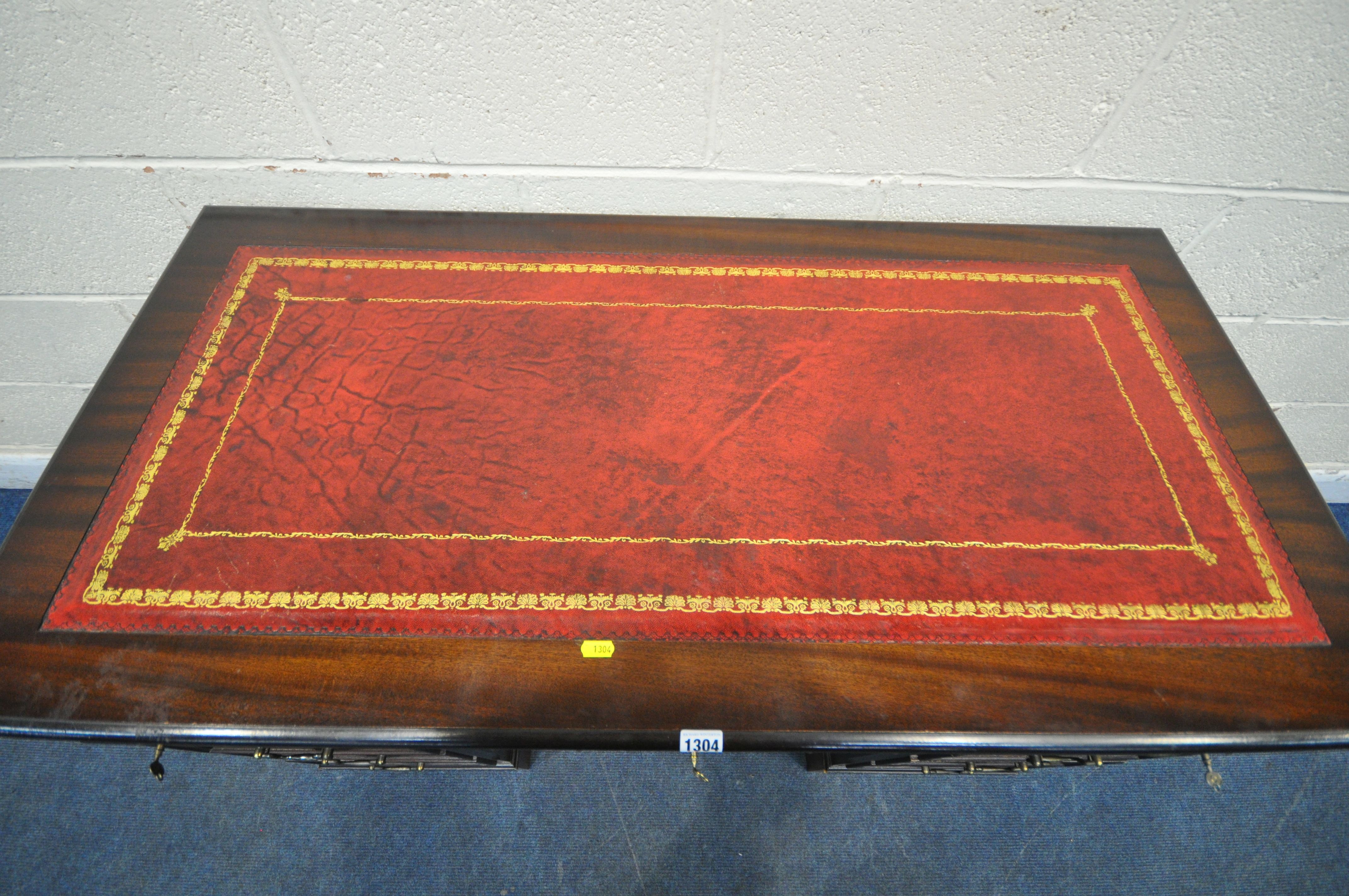 A 20TH CENTURY MAHOGANY TWIN PEDESTAL DESK, with an oxblood leather writing surface, and an - Image 2 of 4
