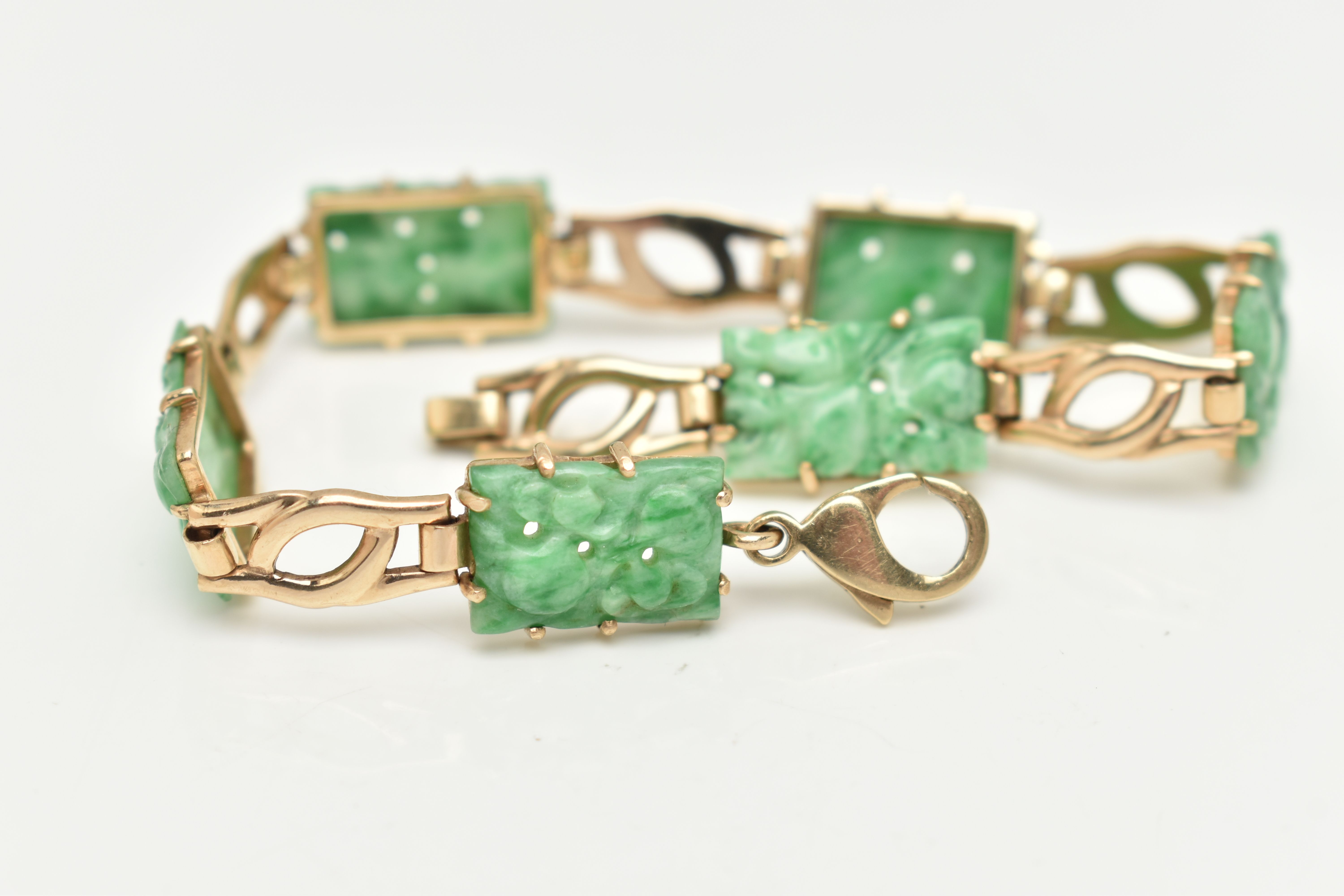 A 9CT GOLD JADE PANEL BRACELET, the rectangular jade panels carved to depict fruits and foliage, - Image 2 of 5