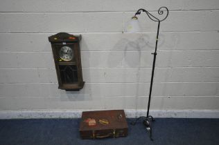 A WROUGHT IRON TELESCOPIC STANDARD LAMP, a 20th century oak clock and a leather case (condition