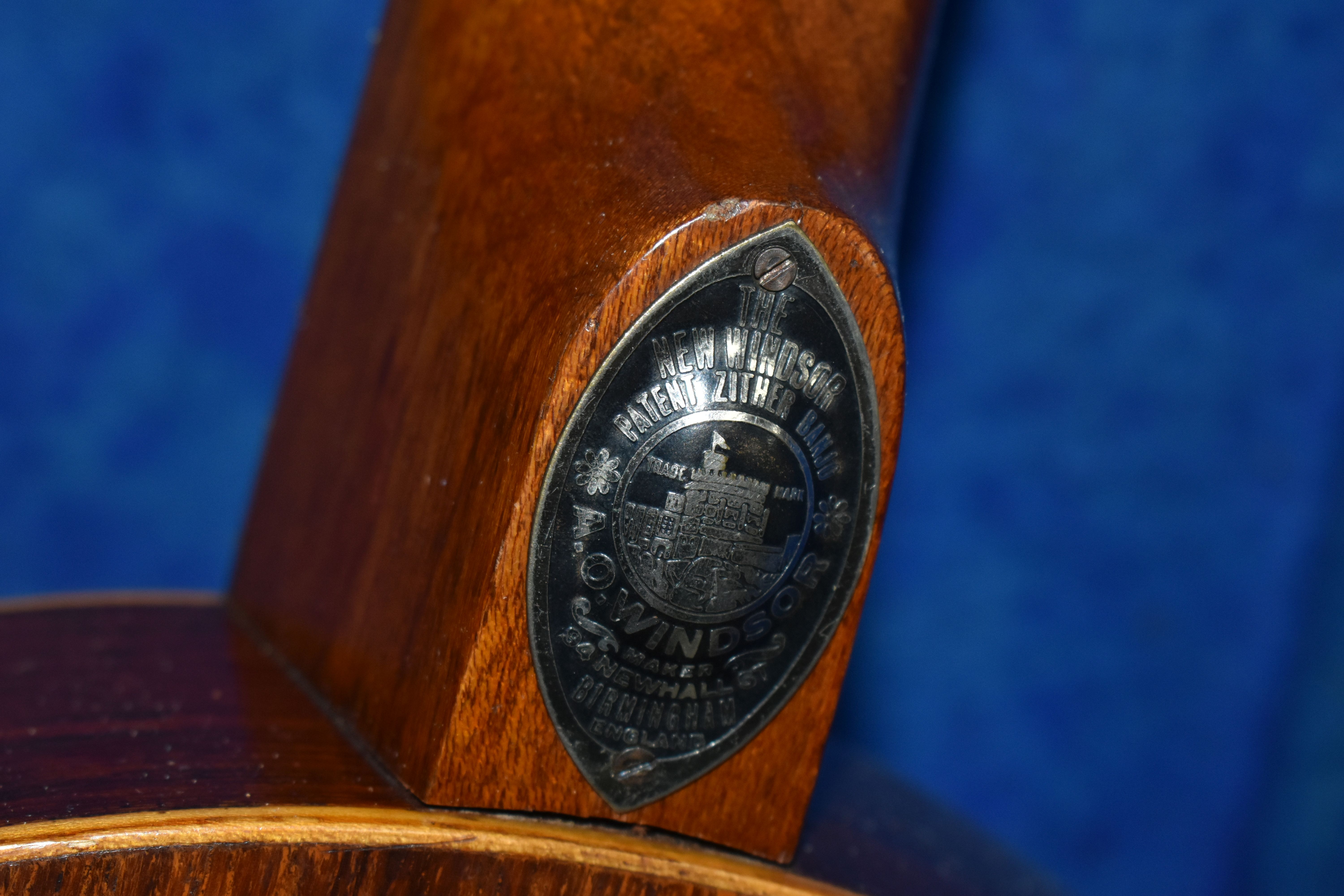 A BANJO AND HARD CASE, comprising 'The New Windsor' patent Zither Banjo made by A.O Windsor of - Image 8 of 10