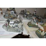 A GROUP OF BOXED COTTAGE SCULPTURES, COLLECTORS PLATES AND DIECAST VEHICLES, to include fourteen