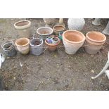 FIVE TERRACOTTA PLANT POTS, two small glazed pots, a metal bucket, etc, the largest pot being 43cm