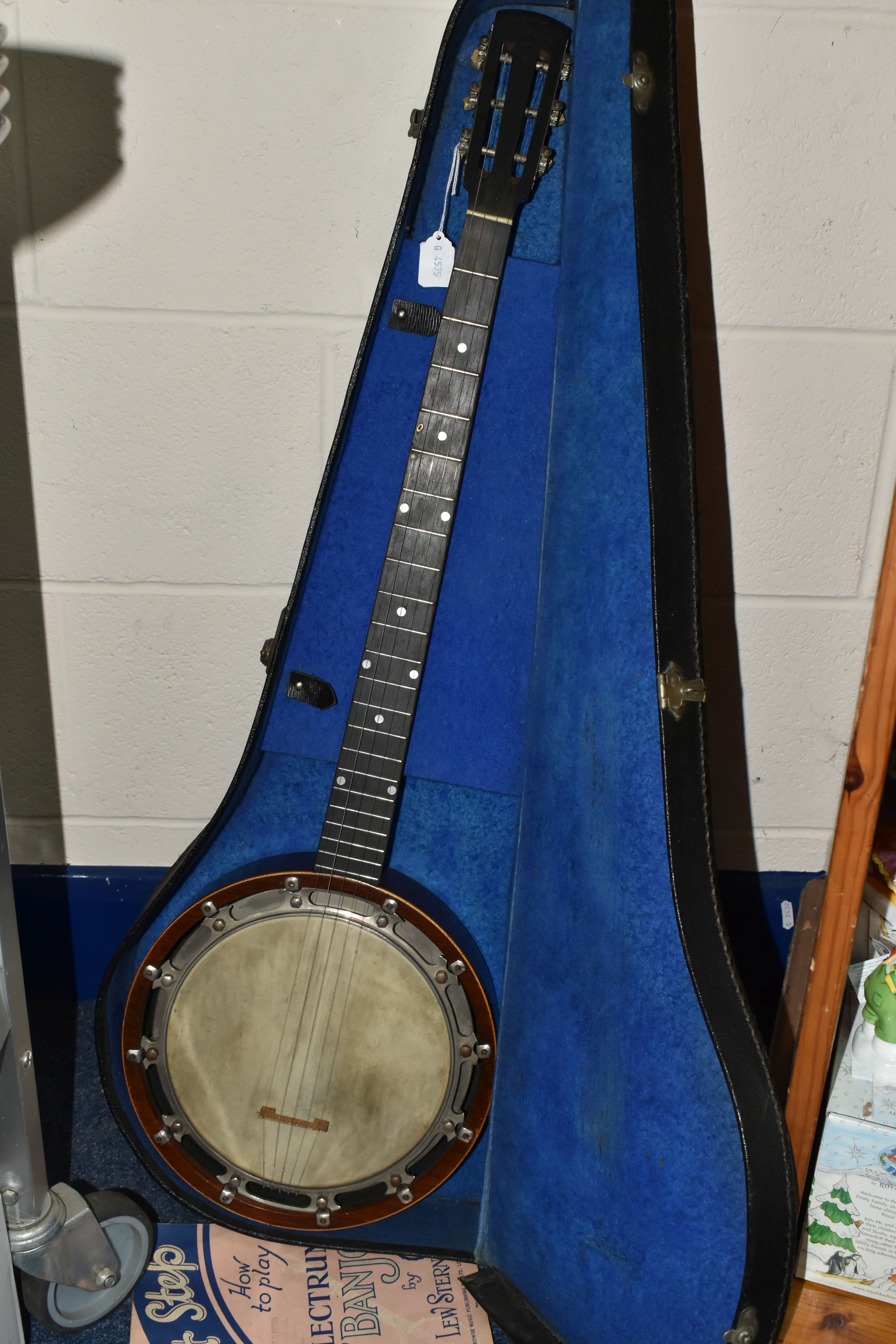 A BANJO AND HARD CASE, comprising 'The New Windsor' patent Zither Banjo made by A.O Windsor of