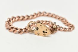 A ROSE METAL CURB LINK BRACELET WITH HEART PADLOCK CLASP, graduated curb link bracelet, links with