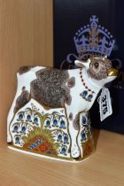 A BOXED ROYAL CROWN DERBY 'BLUEBELL CALF' PAPERWEIGHT, with gold stopper, red printed backstamp