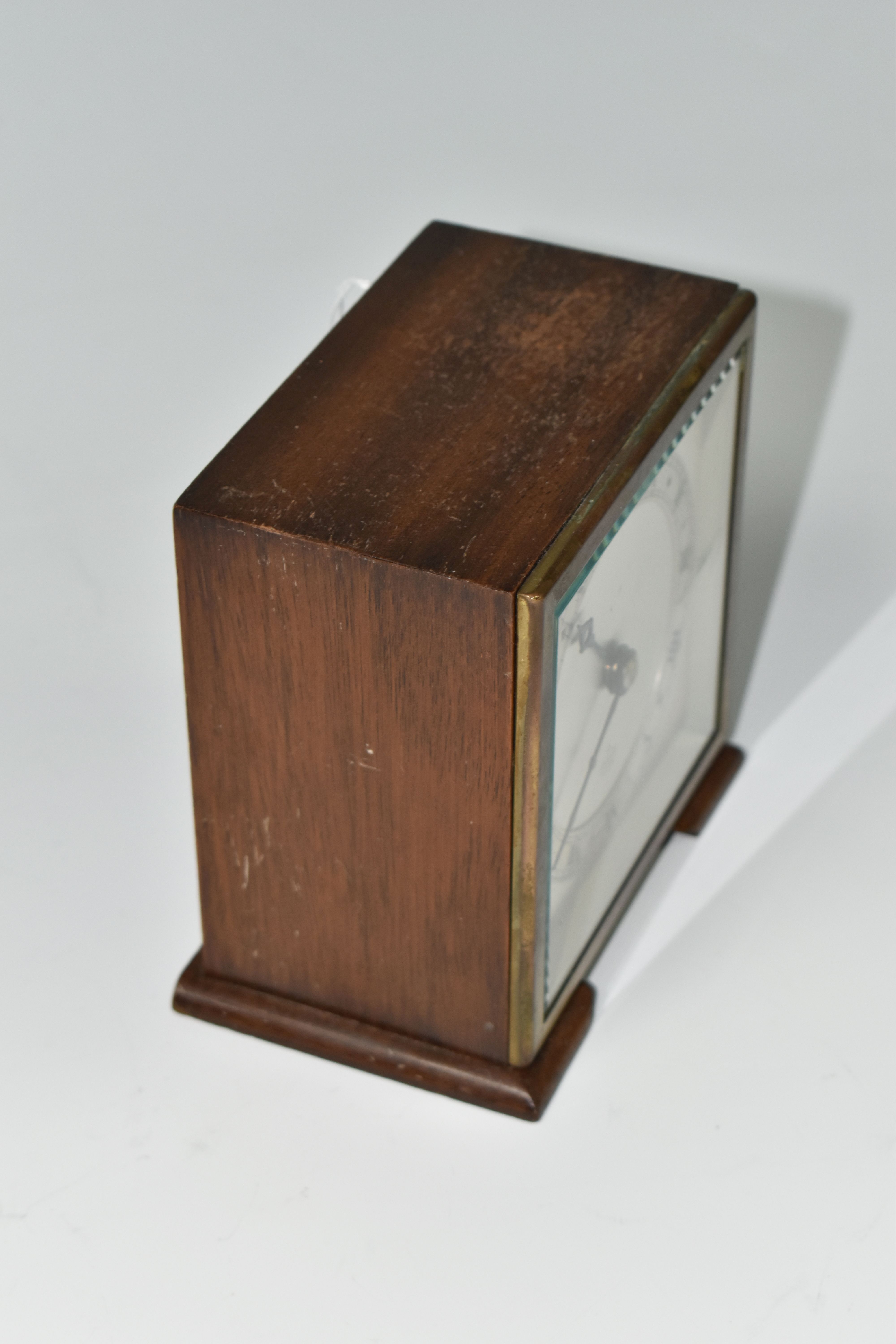 A SMALL ELLIOTT MANTEL CLOCK, the case square in form, raised on two tapering feet, the dial - Image 2 of 6
