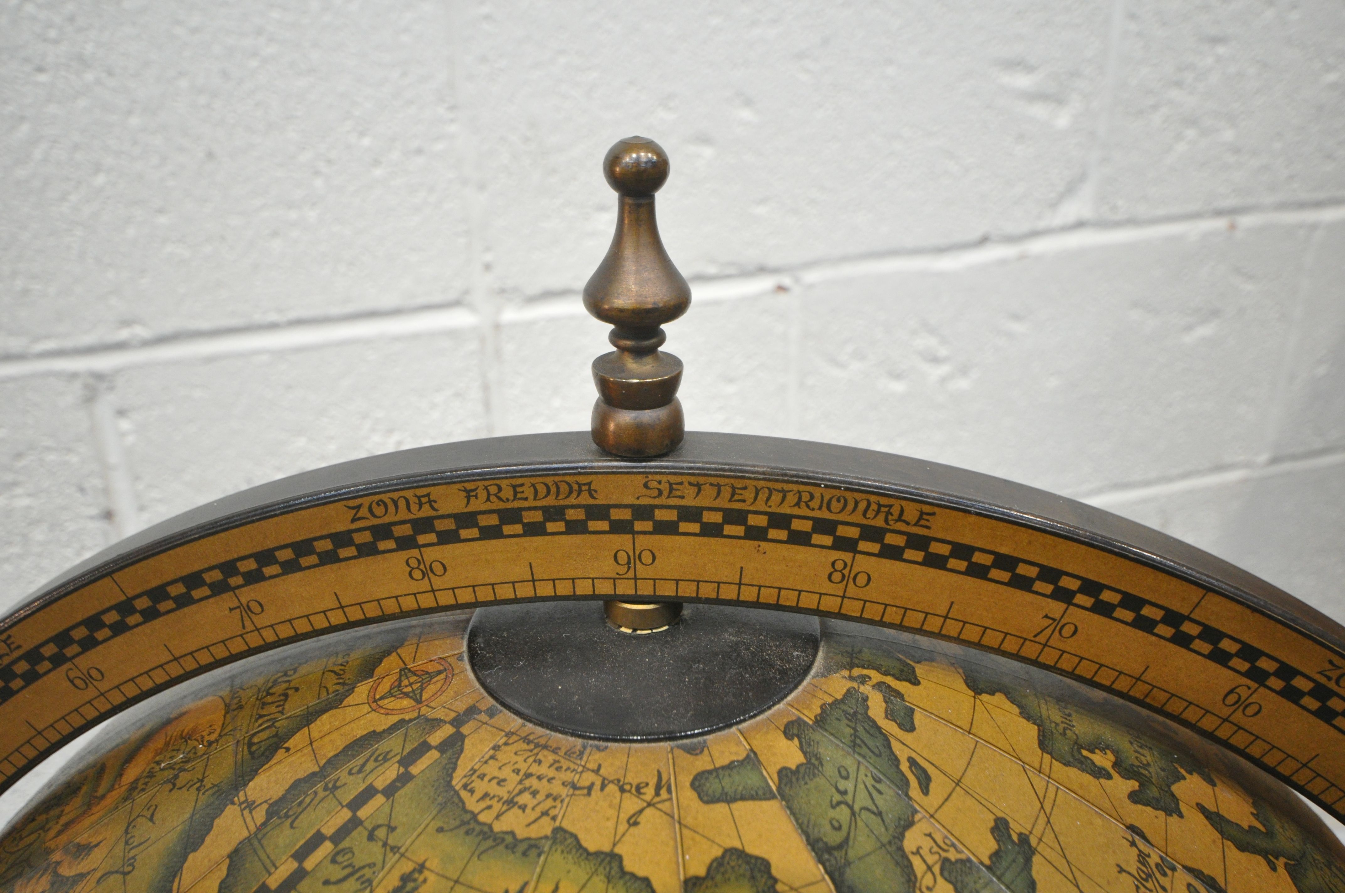 A 20TH CENTURY DRINKS GLOBE, with a hinged lid, enclosing a fitted interior, raised on spiral - Image 2 of 9