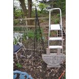 TWO METAL PLANT OBERLISKS, 150cm and 167cm in height an aluminium step ladder and a hardwood folding