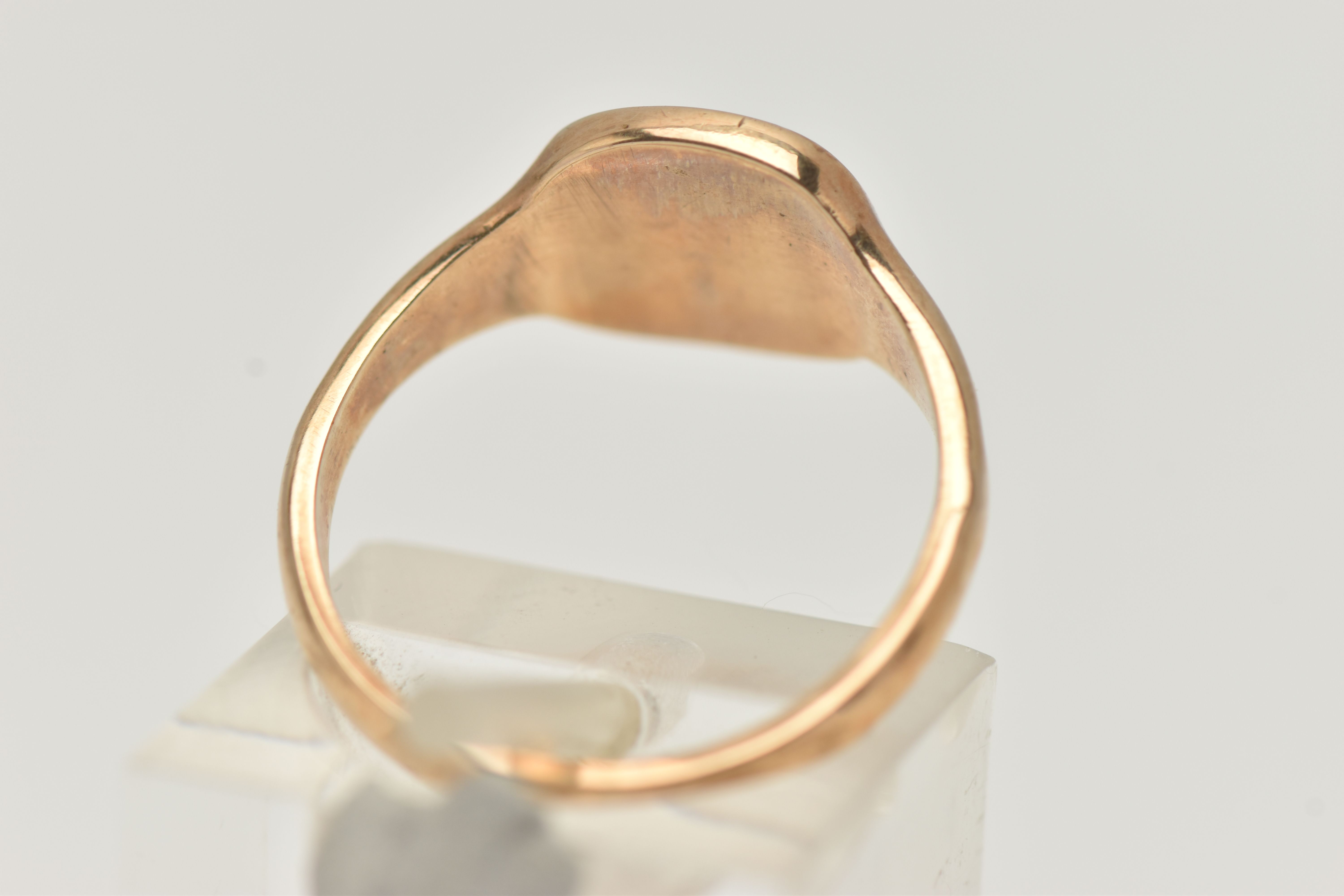 A 9CT GOLD SIGNET RING, rounded square form, with foliate pattern, tapering polished band, - Image 3 of 4