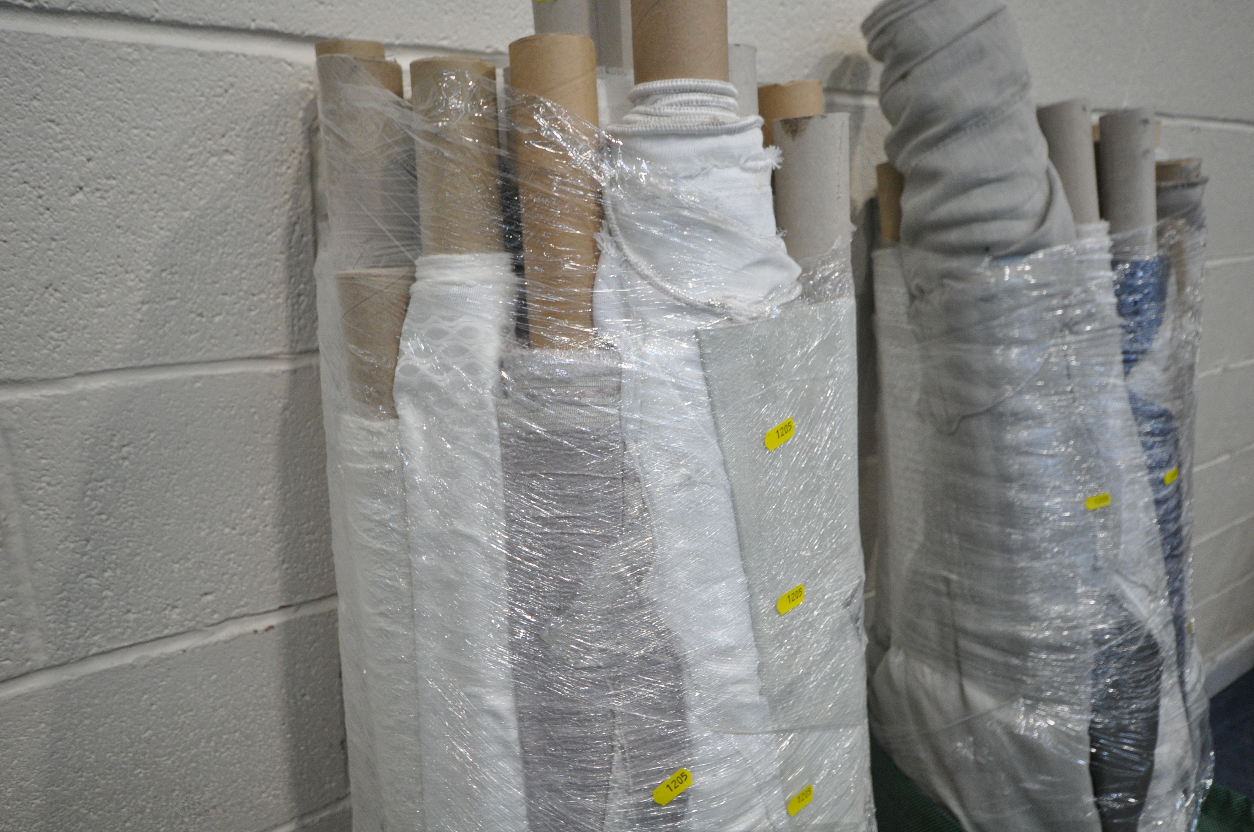 APPROXIMATELY 35 ROLLS OF FABRIC, of various lengths, patterns, styles, etc (condition report: - Image 2 of 5
