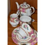 A ROYAL ALBERT 'LADY CARLYLE' PATTERN TEA SET FOR TWO, comprising a small teapot, milk jug, sugar