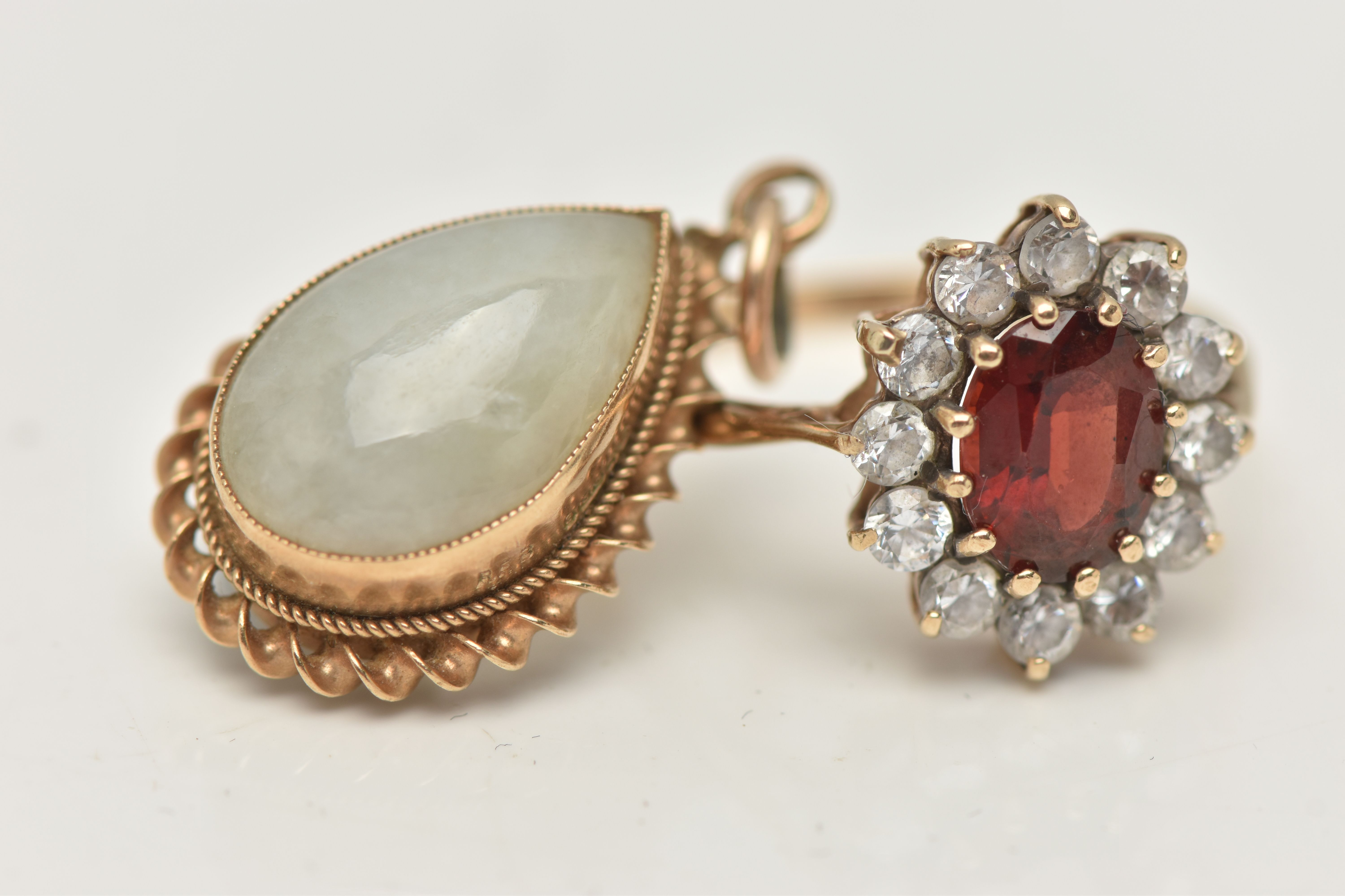 A 9CT GOLD CLUSTER RING AND A PENDANT, the oval cluster set with an oval cut garnet, in a surround - Image 2 of 4