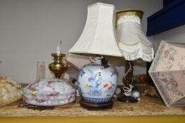A GROUP OF TABLE LAMPS AND TWO 1930S GLASS 'FLYCATCHER' LIGHT SHADES, comprising a mottled orange