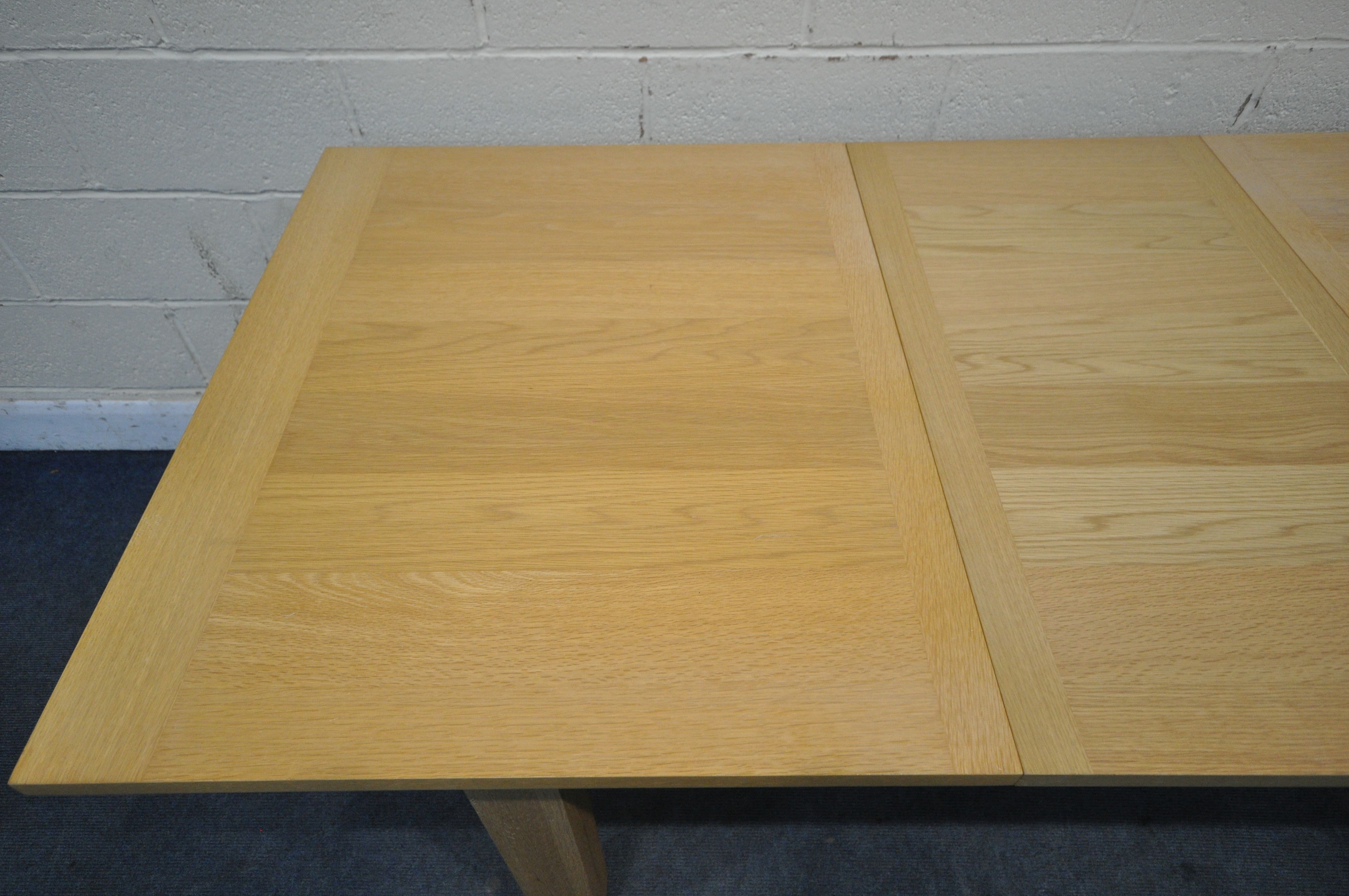 A LIGHT OAK RECTANGULAR EXTENDING DINING TABLE, with one additional leaf, extended length 200cm x - Image 2 of 3