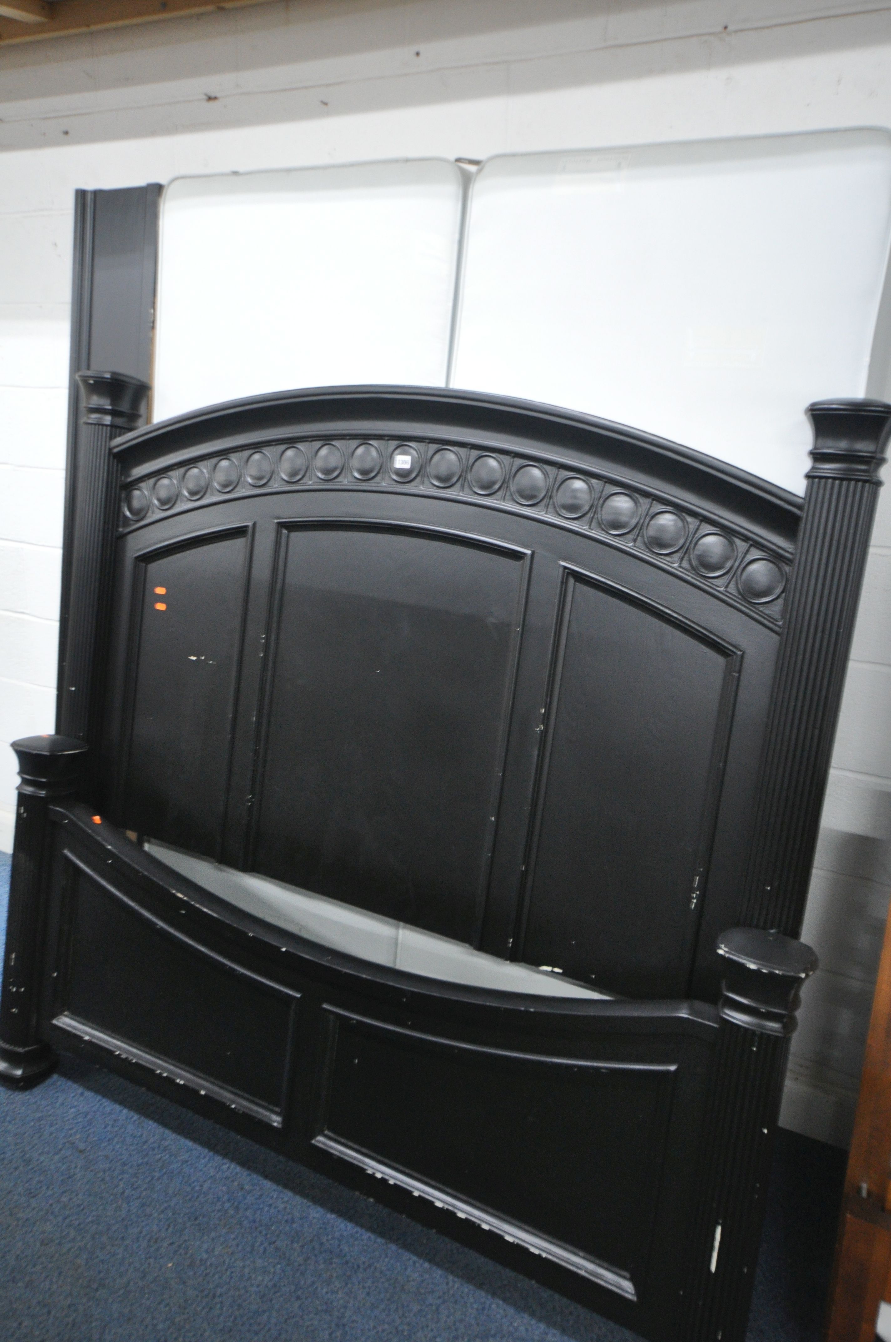 AN LARGE EBONISED 5FT BEDSTEAD, with side rails and slats, and bedstead mattress bed bases (