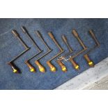 A BOX CONTAINING SEVEN VARIOUS TABLE WINDING HANDLES (condition report: general signs of wear and