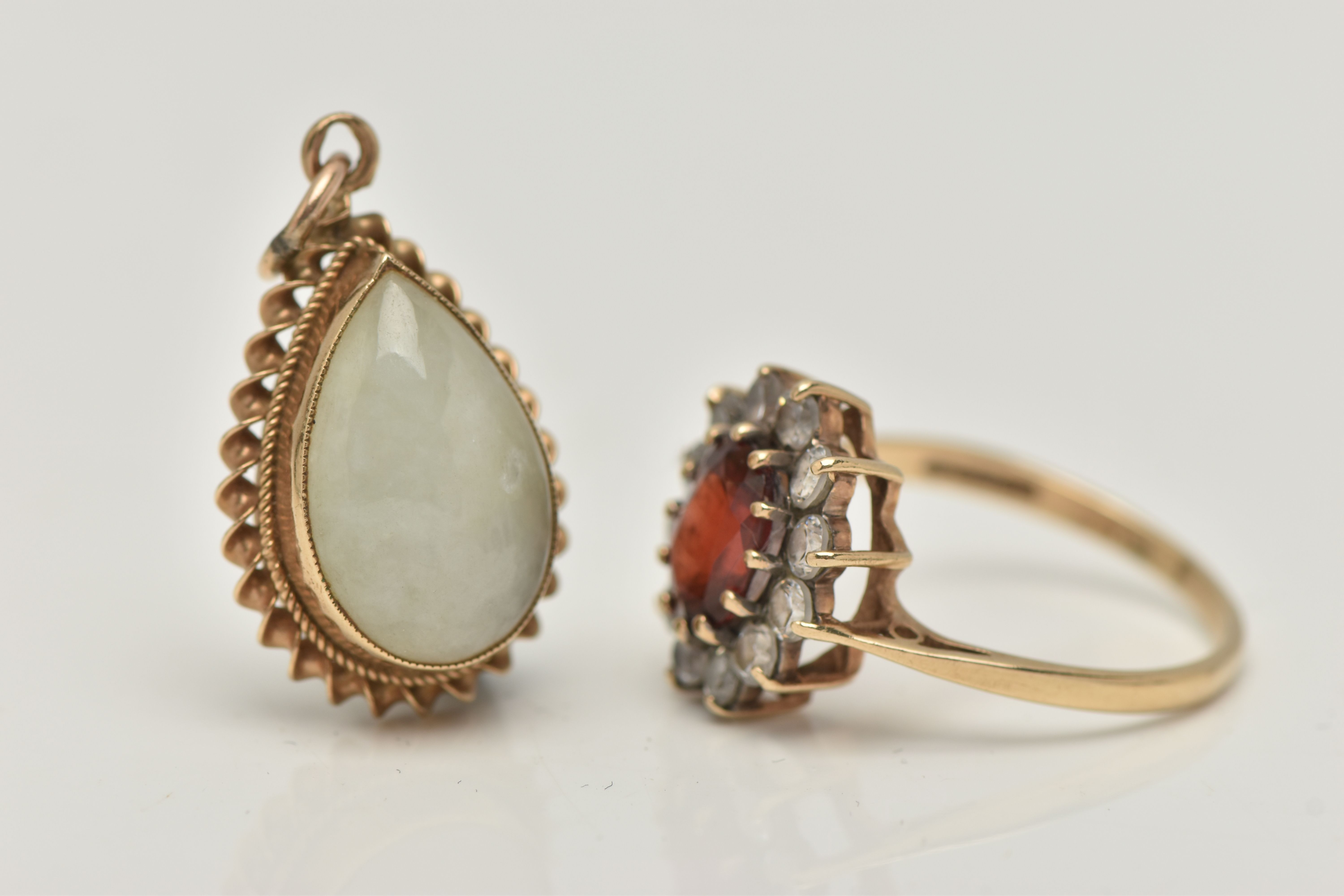 A 9CT GOLD CLUSTER RING AND A PENDANT, the oval cluster set with an oval cut garnet, in a surround - Image 3 of 4