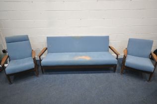 GUY ROGERS, A MID CENTURY TEAK 'MANHATTAN' THREE PIECE SUITE, covered with blue fabric, comprising a
