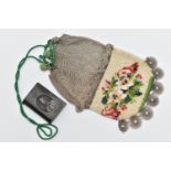 A CHAIN MAIL PURSE AND A VULCANITE VESTA CASE, white metal chain mail with a decorative floral
