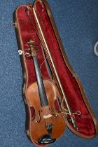 A CASED LATE NINETEENTH CENTURY 3/4 SIZE VIOLIN, bearing label reading 'Lutherie Artistique, T.