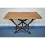 AN EARLY VICTORIAN MAHOGANY FOLDING CAMPAIGN COACHING TABLE, with a rectangular top, raised on a