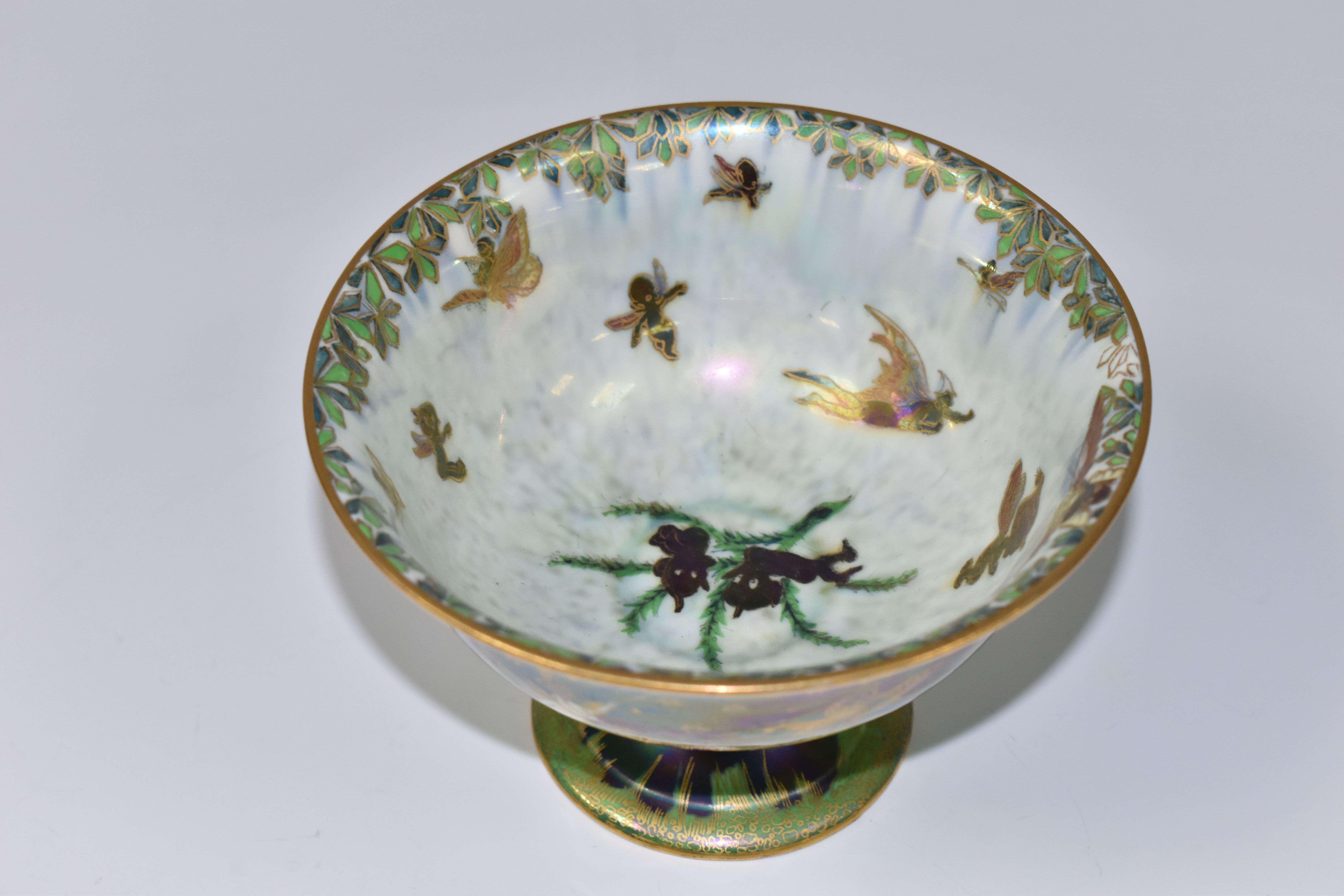 A WEDGWOOD FAIRYLAND LUSTRE FOOTED BOWL, decorated with a mother of pearl lustre with fairies in - Image 4 of 9