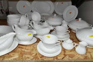 A QUANTITY OF WEDGWOOD 'CANDLELIGHT' DESIGN DINNERWARE, comprising three gravy/sauce jugs and