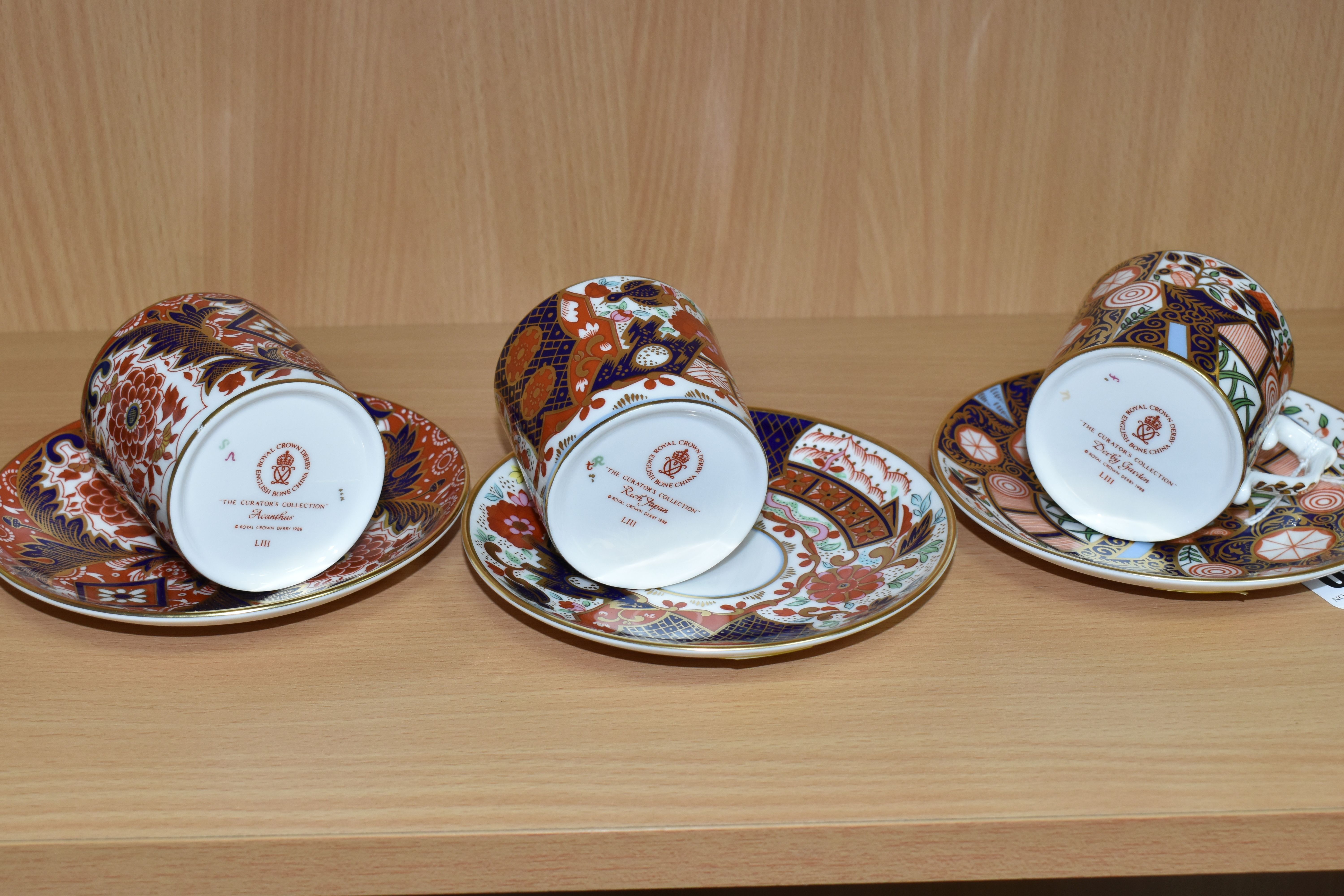 THREE ROYAL CROWN DERBY COFFEE CANS AND SAUCERS, from 'The Curator's Collection' in Rich Japan, - Image 2 of 5